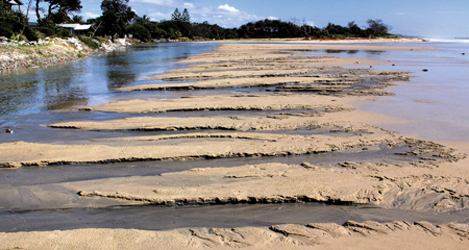 The lagoon outlet and the beach after a storm